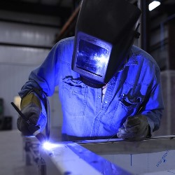 welder working in Dows IA shop